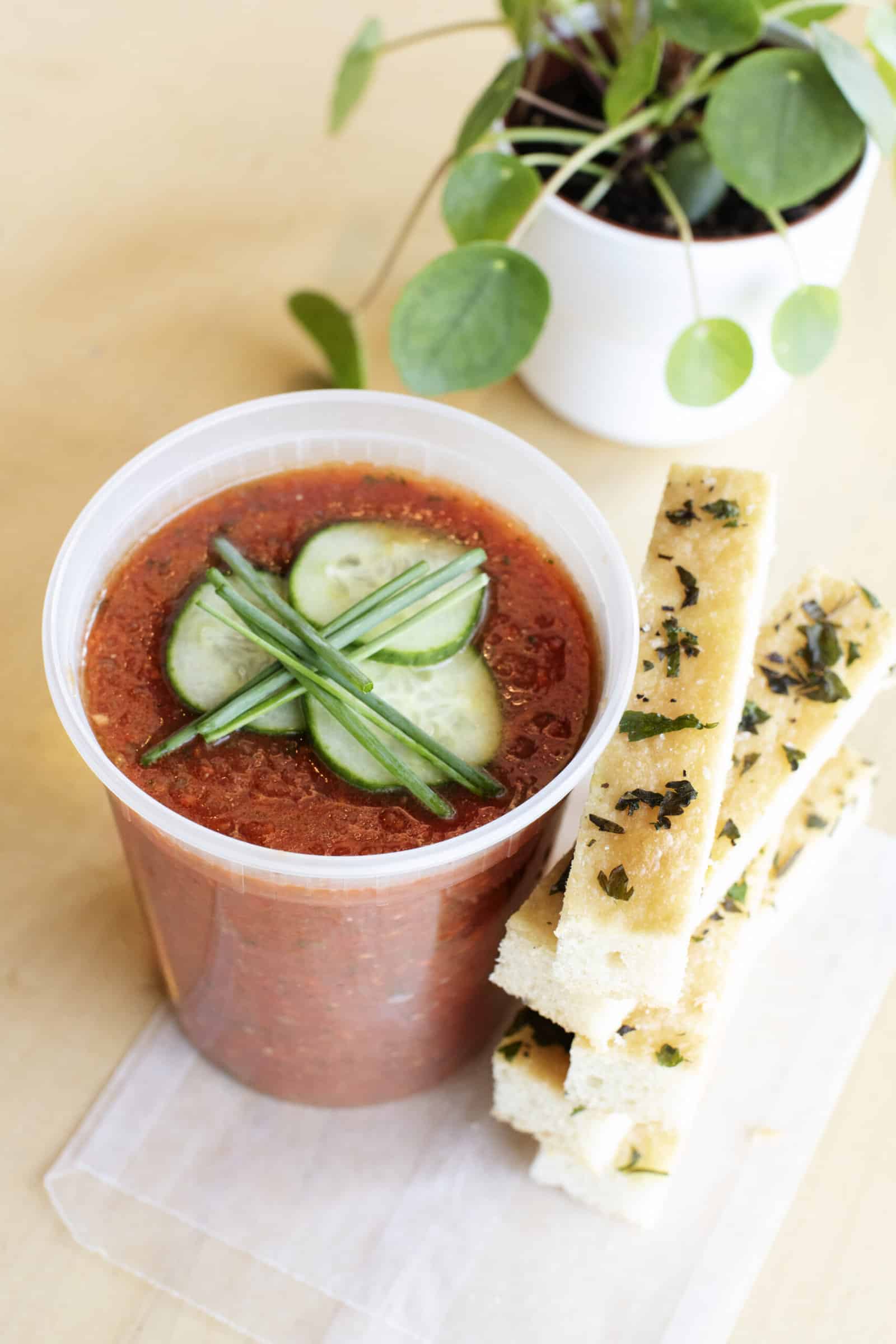 a quart of takeout gazpacho soup from yum! Kitchen and Bakery