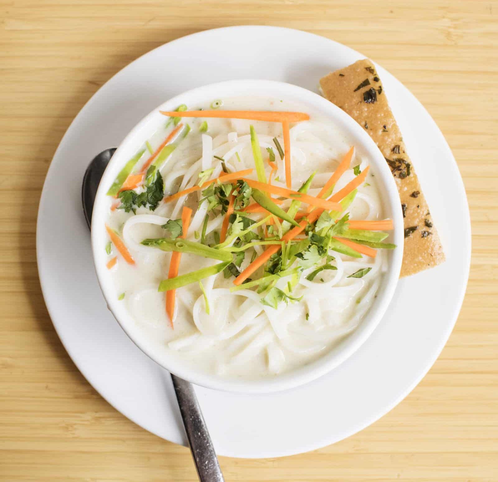 a bowl coconut curry w/ chicken soup from yum! Kitchen and Bakery